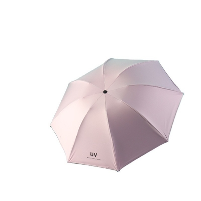 Des parapluies pliables de 21 pouces, à l'épreuve du vent, manuels, ouverts et pliables, de style minimaliste pour une protection solaire.