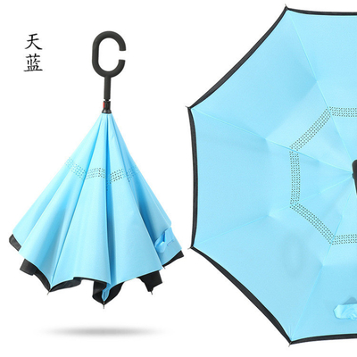 Parapluie inverse compacte avec poignée en forme de C et arbre métallique recouvert de noir