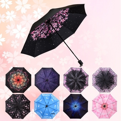 Parapluie en plastique à commande manuelle à trois couches avec motif à trois couches