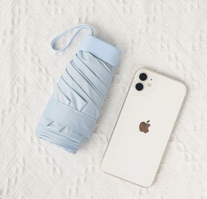 X503 Sac de carton parapluie protection UV et petite poche pour un transport facile les jours ensoleillés