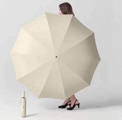 Hommes et femmes cadre en fibre de verre triple pliable compact Parapluie solaire UV pour les voyages