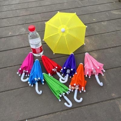 Manuel du parapluie pour téléphones portables en plein air en vélo ouverte Petite taille Protection contre la pluie et le vent