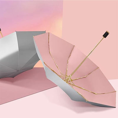 Parapluie de protection solaire en tissu de nylon 190T avec conception triple pli et support en or Macaron